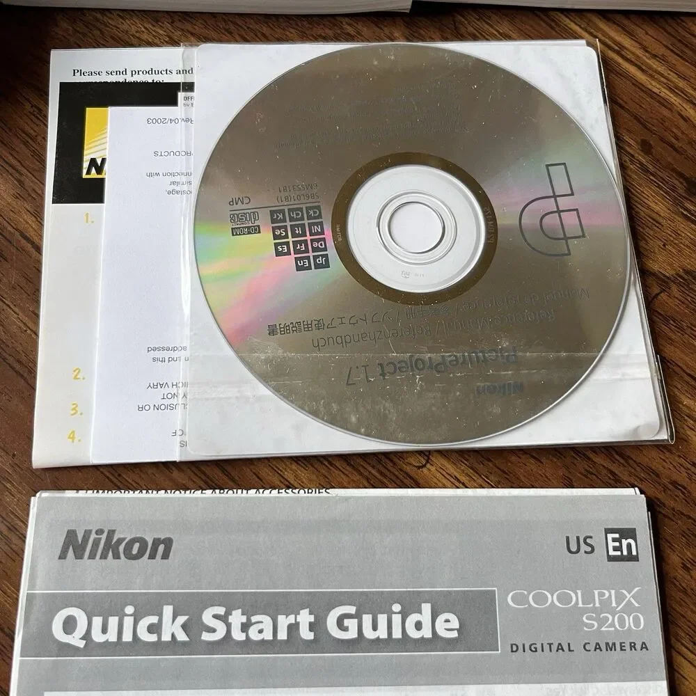 Nikon Coolpix S200  Camera Package Works Silver Battery SD Card Case Manual 7.1